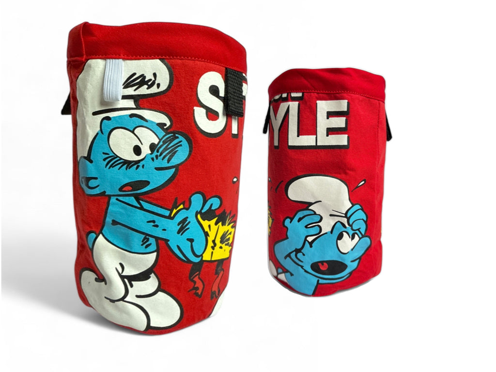 Red Chalkbag Jokey Smurf holding an expolded gift